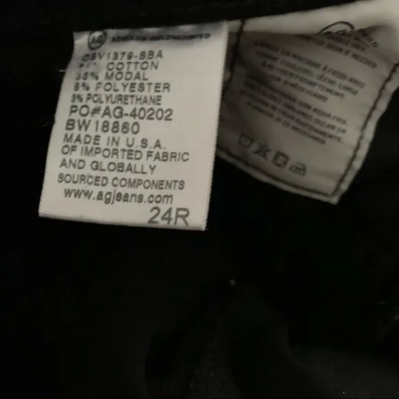 AG The Farrah high risk skinny black velvet jeans