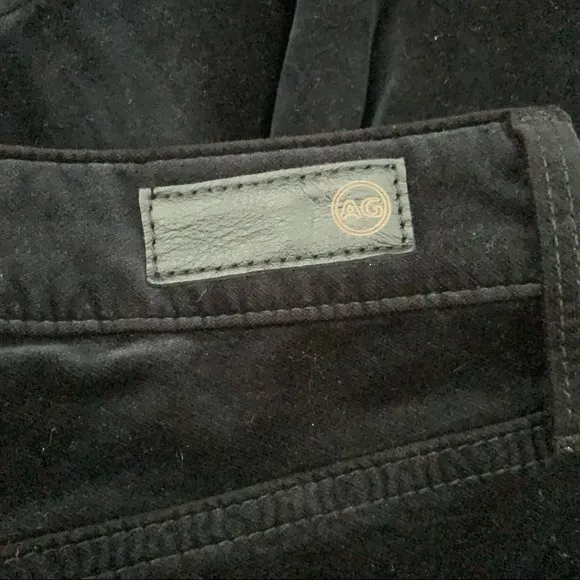 AG The Farrah high risk skinny black velvet jeans